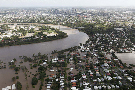 Brisbane a 'war zone' as huge flood smashes city 